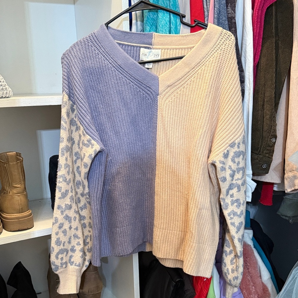Elegant V-Neck Sweater with Leopard Print Sleeves